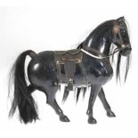 Figur "Pferd", Holz schwarz gefaßt, H. 31 cm, L. 31 cm- - -23.80 % buyer's premium on the hammer