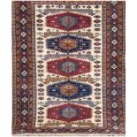 Lahore, dunkelgrundig, mit zentralem Muster, leicht fleckig, 178x127 cm- - -23.80 % buyer's