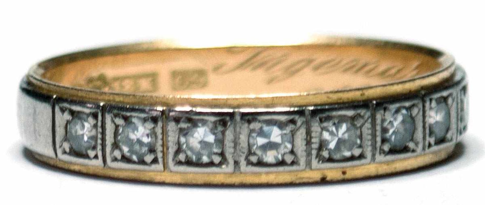 Memory-Ring, 18 k GG/WG, Schauseite besetzt mit 8 Brillanten von zus. 0,24 ct. punziert,innen