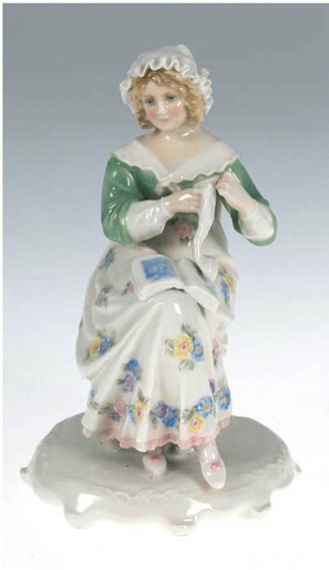 Porzellanfigur "Sitzende Frau mit Buch", Volkstedt, Ens, polychrom bemalt, H. 15 cm- - -23.80 %