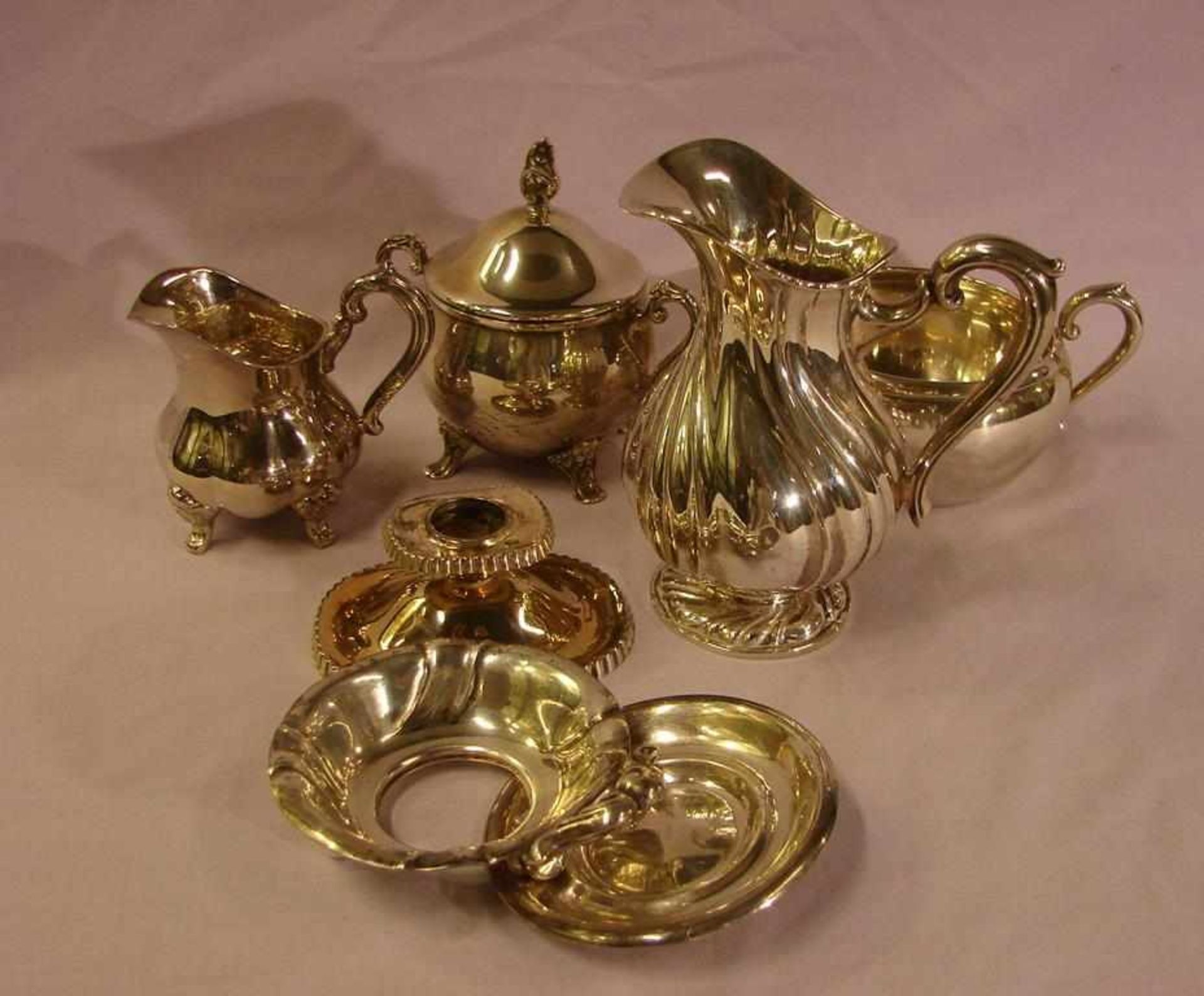 Konvolut Silber: 800/835/Sterling, ca. 827 gr., 6 Teile,Sahnekännchen, Kerzenleuchter, Milch und