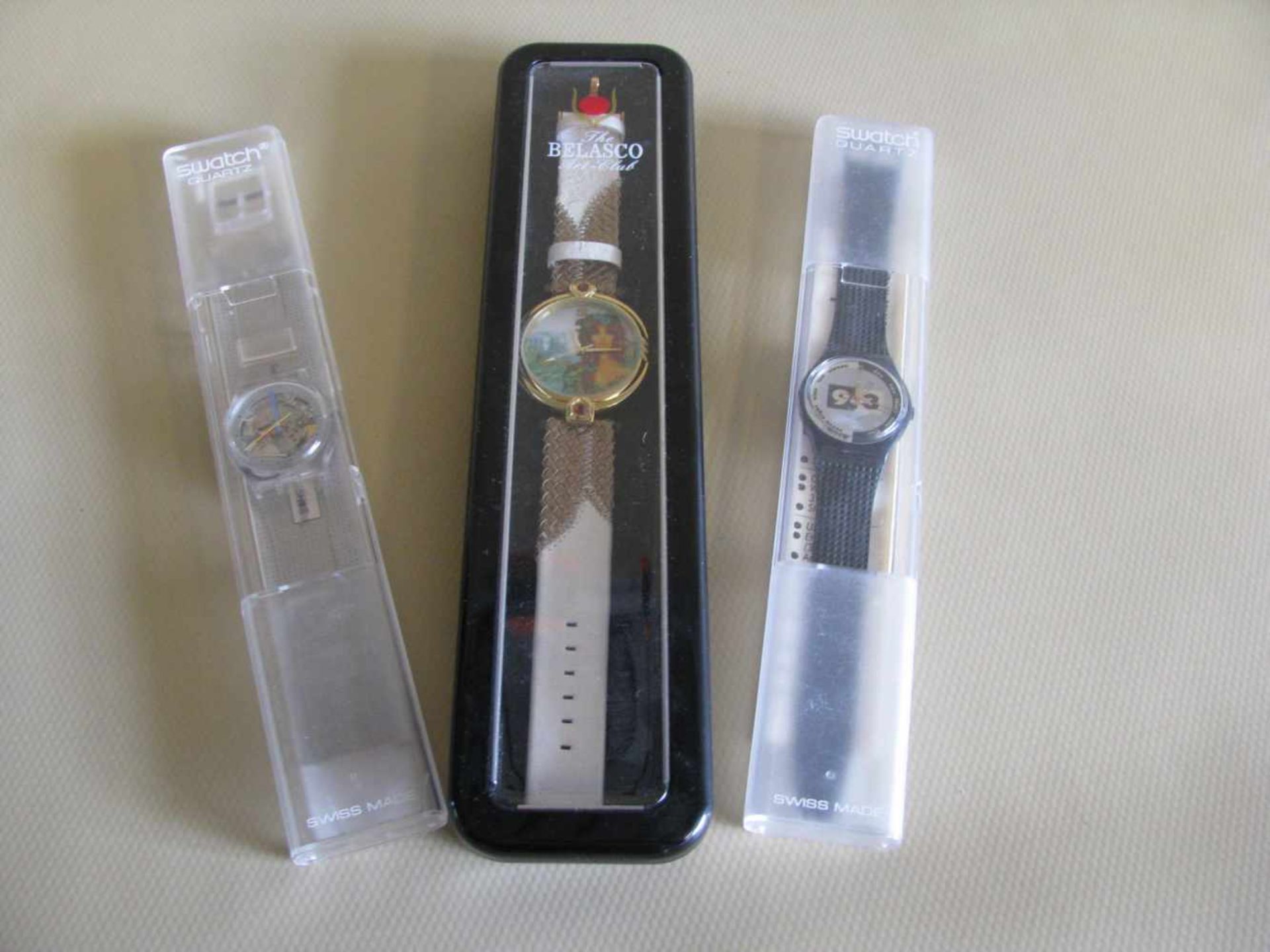 Konvolut von 3 diversen Armbanduhren, 2 x Swatch und 1 x Belasco, OVP.