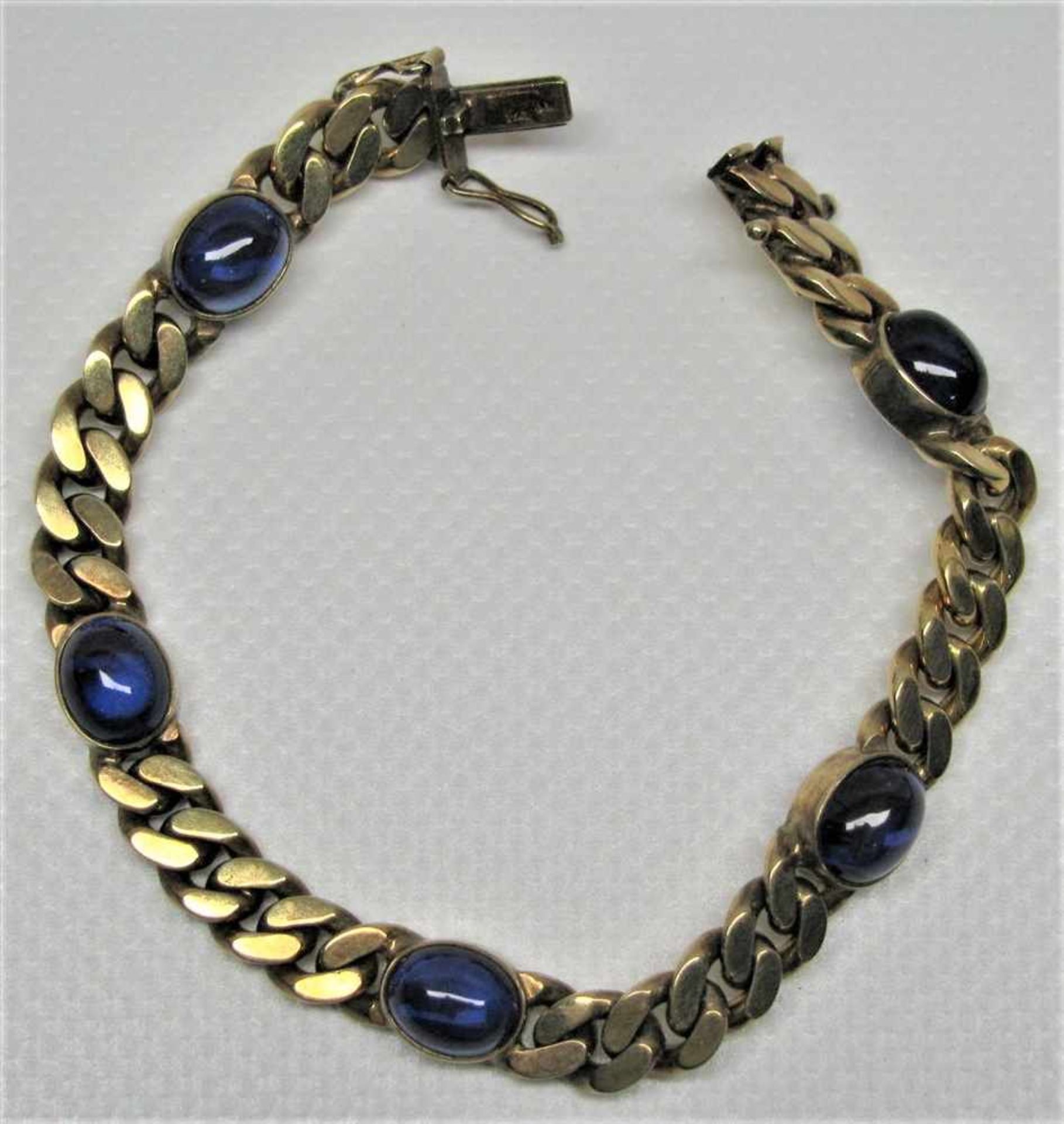 Panzerarmband besetzt mit 5 blauen Cabochons, 835er Silber vergoldet, gepunzt, 29 g, l 19,5 cm, b