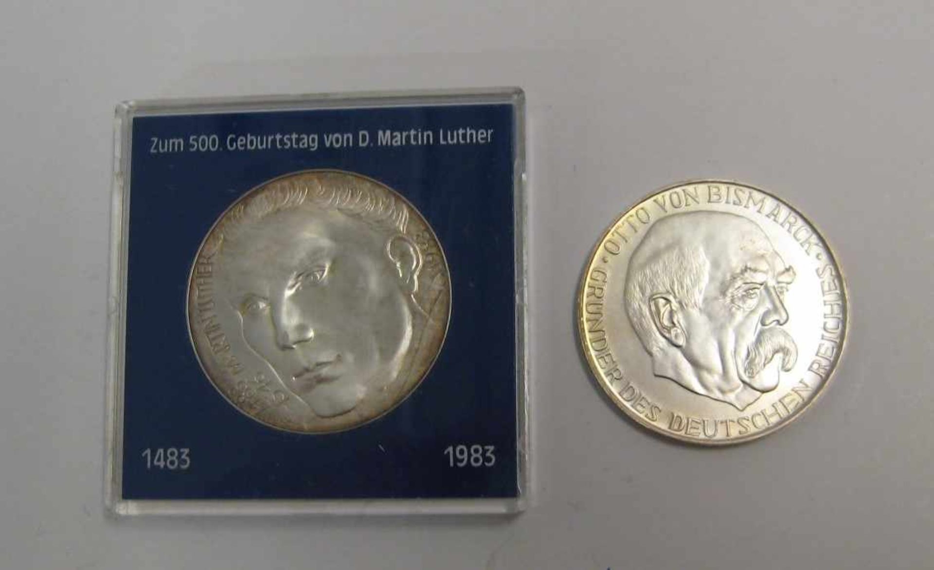 2 Gedenkmünzen, Otto von Bismarck/Martin Luther, 1983, 1000er Silber, zus. 60 g, d 3,9 cm.