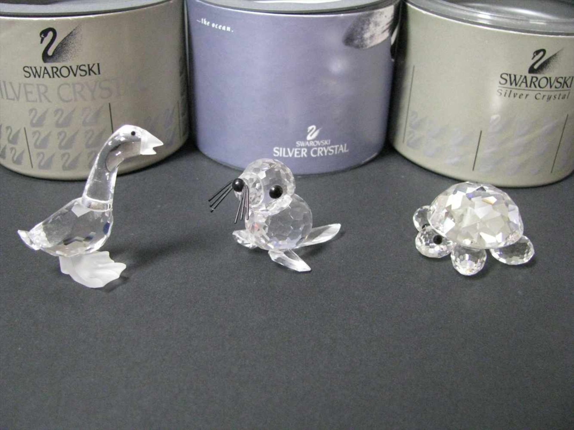 3 teiliges Konvolut diverser Swarovski Figuren, Schildkröte, Seehund und Gans, Kristallglas