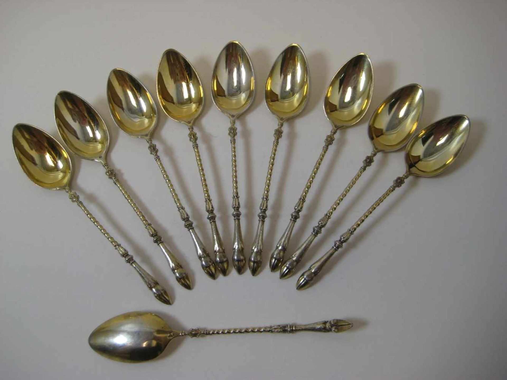 10 Teelöffel, Deutsch, 800er Silber, gepunzt, 92 g, Griffe in Form von Geißenfüßen, teilvergoldet, l