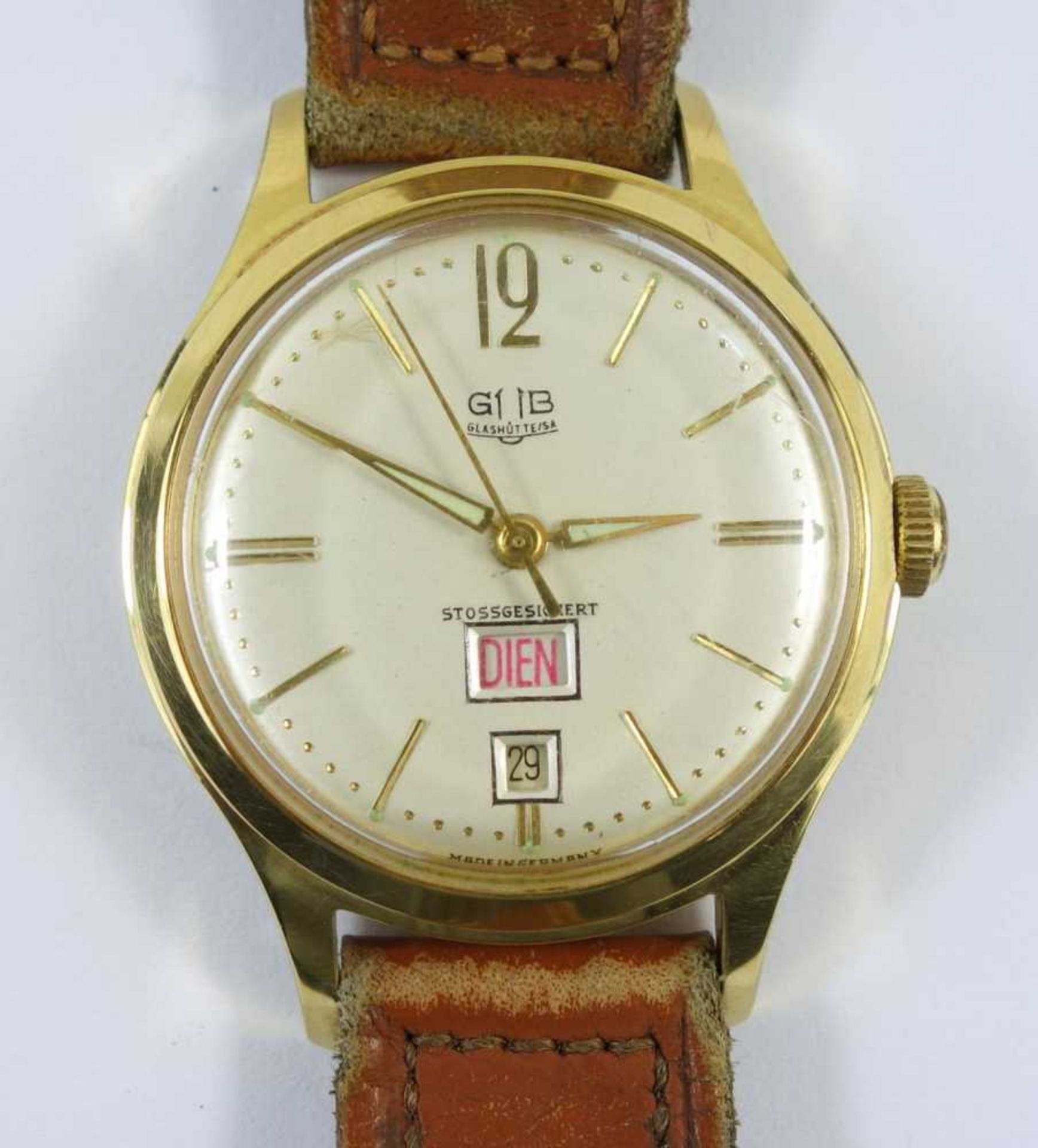 Armbanduhr Glashütte, Ende 50er Jahre, Kal. 66.1 vergoldetes Gehäuse, Zifferblatt mit Datum und