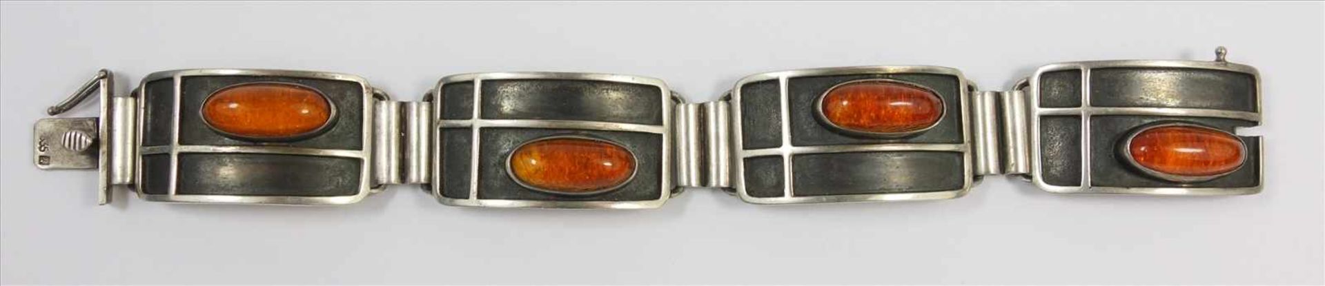 Armband mit Bernsteinen, 835er Silber, ungedeutete Punze JAK legiert, Gew.36,0g, 4 ovale