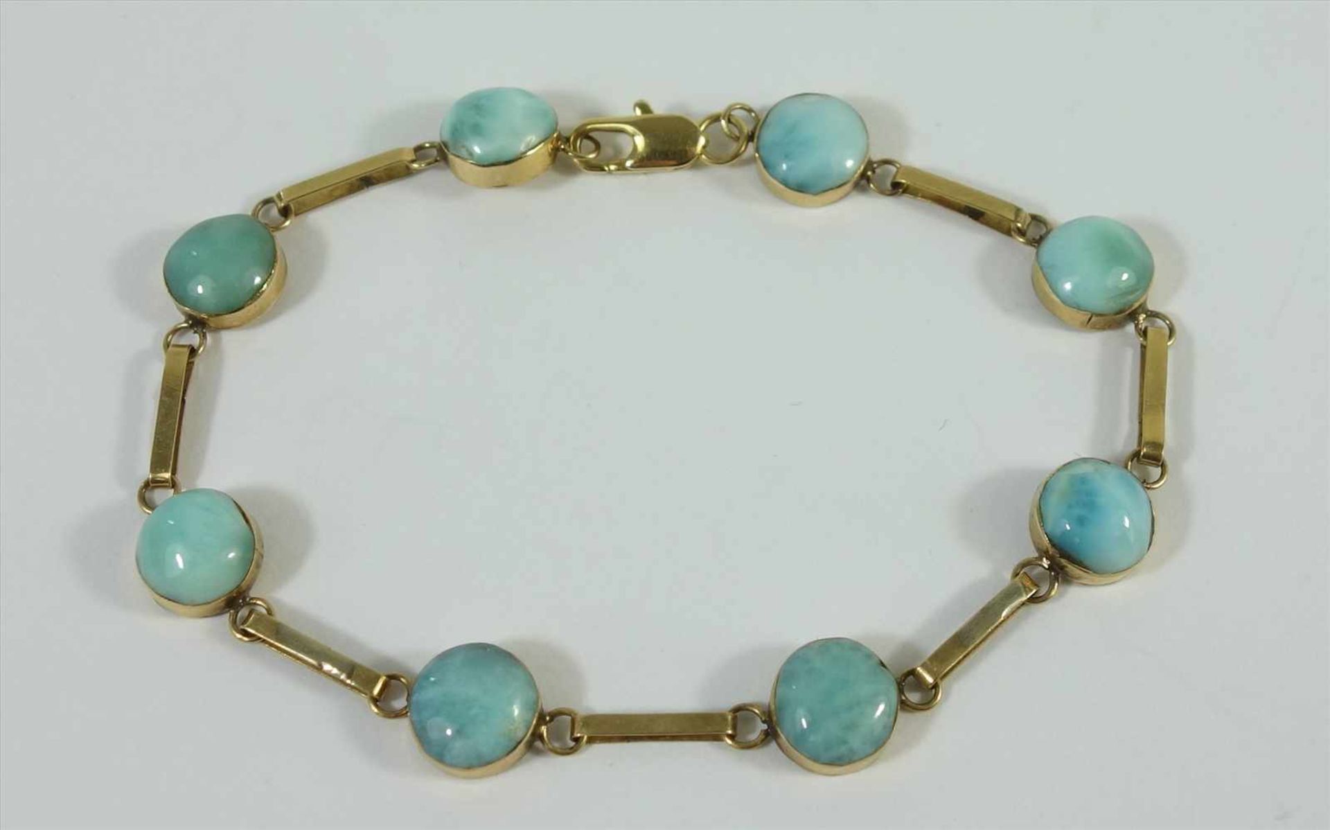 Armband mit 8 Türkisen, 585er Gold, Gew.5,8g, 8 runde Cabochons, Karabinerverschluss, L.18,5cm