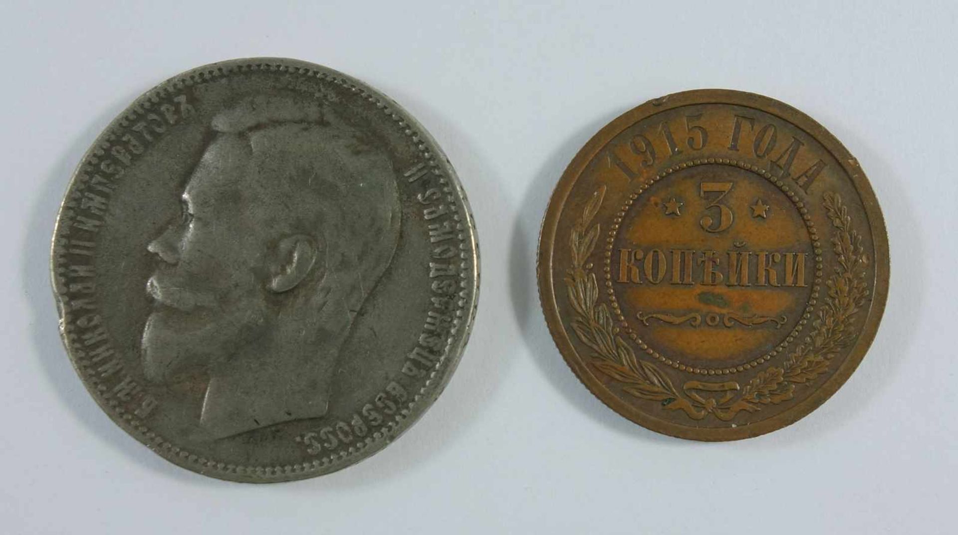 5 Kopeken 1915 und 1 Rubel 1899, Cu, Ag, unterschiedliche Erhaltung- - -18.00 % buyer's premium on