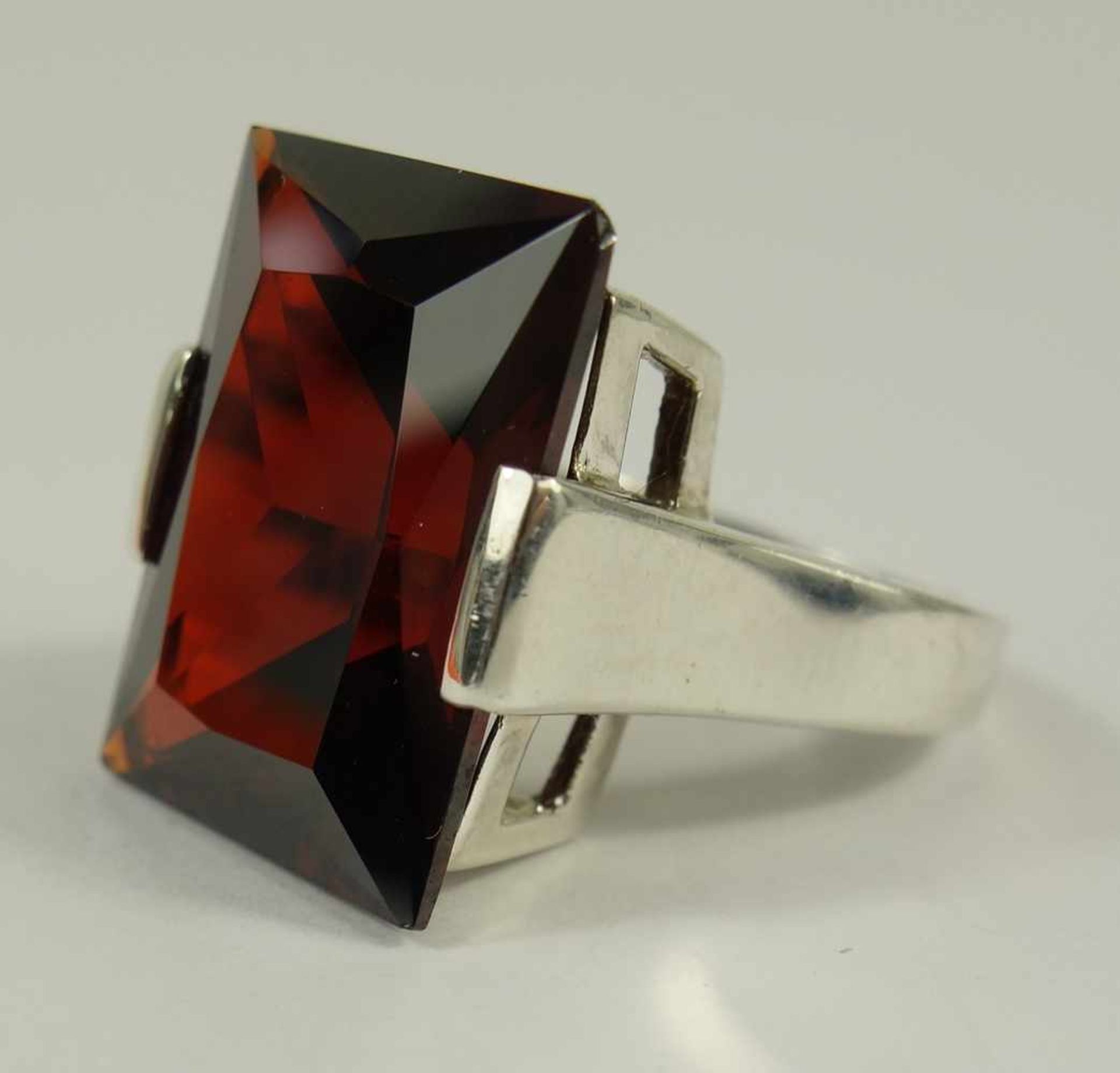 Ring mit rubinrotem Stein, 925er Silber, Gew.13,71g, Stein ca.15*20mm, U.59Ring with ruby red stone,