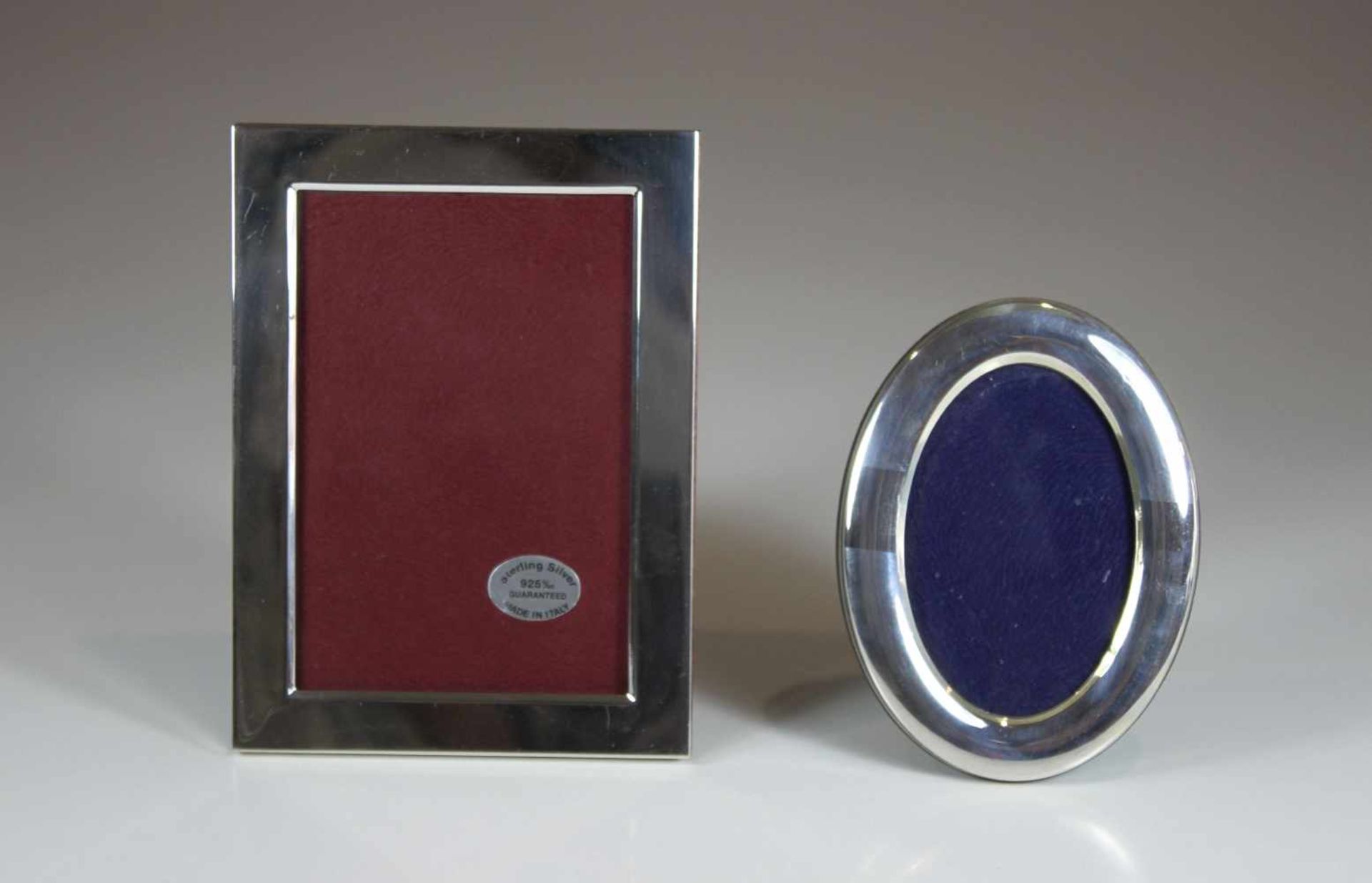 Zwei Bilderrahmen, Silber 800 und 925, oval (Bildgr. 10,5 x 7,5 cm) und eckig (Bildgr. 9x 13 cm),