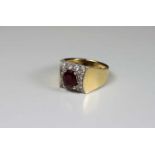 Ring, Gold 18 kt., eckiger Kopf, mit Brillanten und einem Rubin besetzt, 4 x 6 Brillanten je 0,03