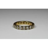 Memory Ring, um 1990, Gelbgold 585, Ges.-Gew ca. 5,3 g, besetzt mit 18 Brillanten, zusammen ca. 2,70