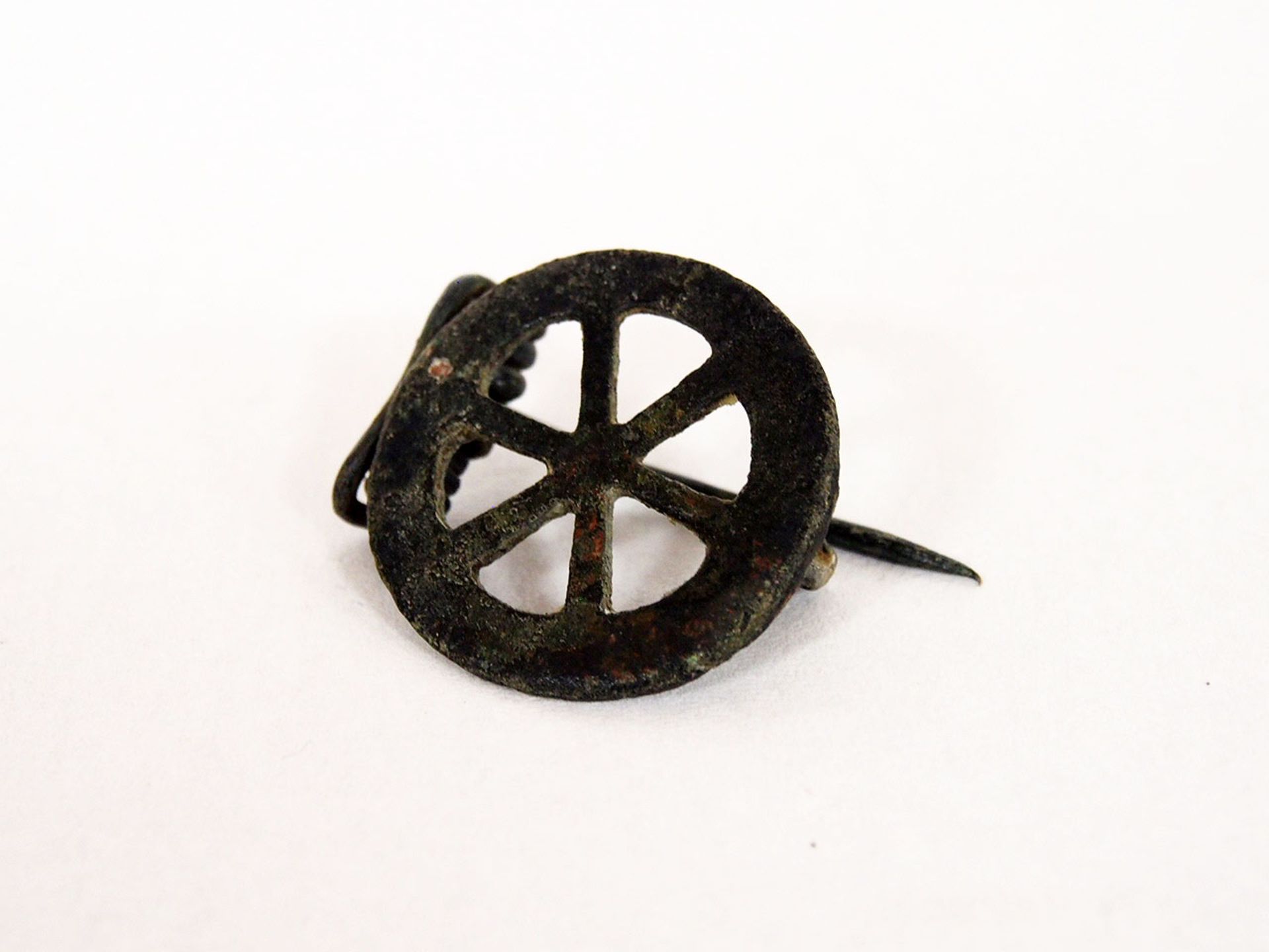 RädchenfibelBronze, Römisch 3. / 4. Jh. n. Chr., Durchmesser 3 cm