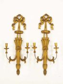 Paar zweiarmige WandleuchterFrankreich, 19. Jh., Holz, geschnitzt, vergoldet, Höhe 80 cm- - -25.00 %