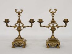 Paar zweiarmige KerzenleuchterBronze, China, um 1900, Höhe 28 cm- - -25.00 % buyer's premium on