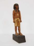 Schreitende männliche Figur mit Nemes-KopftuchHolz, vollrund geschnitzt, farbig gefasst, Ägypten,