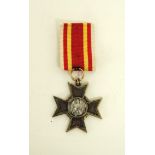 BadenKriegsverdienstkreuz 1916, am Bande. Bronze vergoldet.