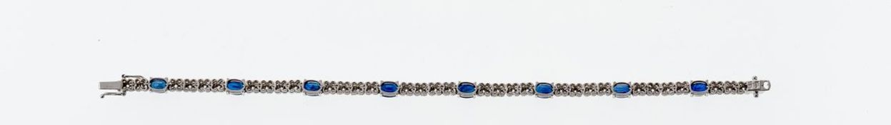 Saphir-BrillantarmbandWG, 585. Rivière-Armband ausgefasst mit acht oval facettierten Saphiren (4