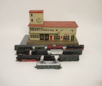 Konvolut Eisenbahnen und ZubehörBestehend aus einer Fleischmann Diesellok V 100 2075, einer Lima E-