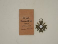 Deutsches Reich 1933-1945Kriegsverdienstkreuz 2. Klasse mit Schwertern. In Verleihungstüte (etwas