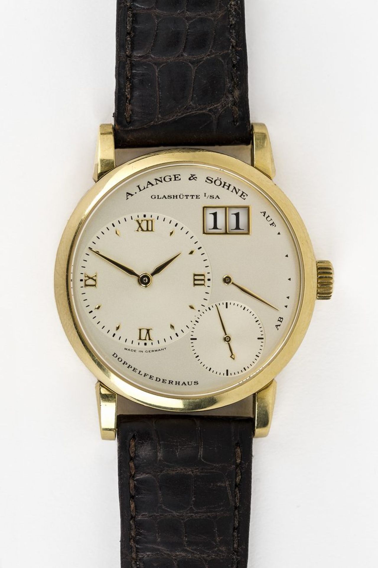 A. Lange & Söhne HerrenarmbanduhrLANGE 1. Gehäuse GG, 750, nummeriert 120821. Cremefarbenes