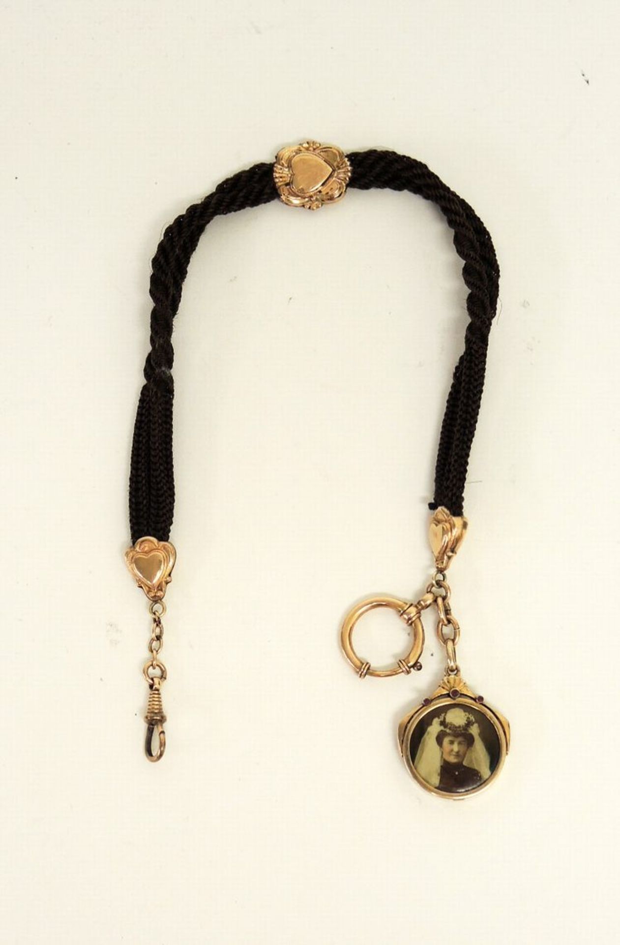 Biedermeier-UhrenketteGG, 333 und Haar. Fein geknotete Kordel mit Goldmontierung und goldenem