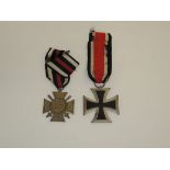 Deutsches ReichZwei Orden. Frontkämpferkreuz am Bande sowie Eisernes Kreuz 2. Klasse 1939 am Bande.