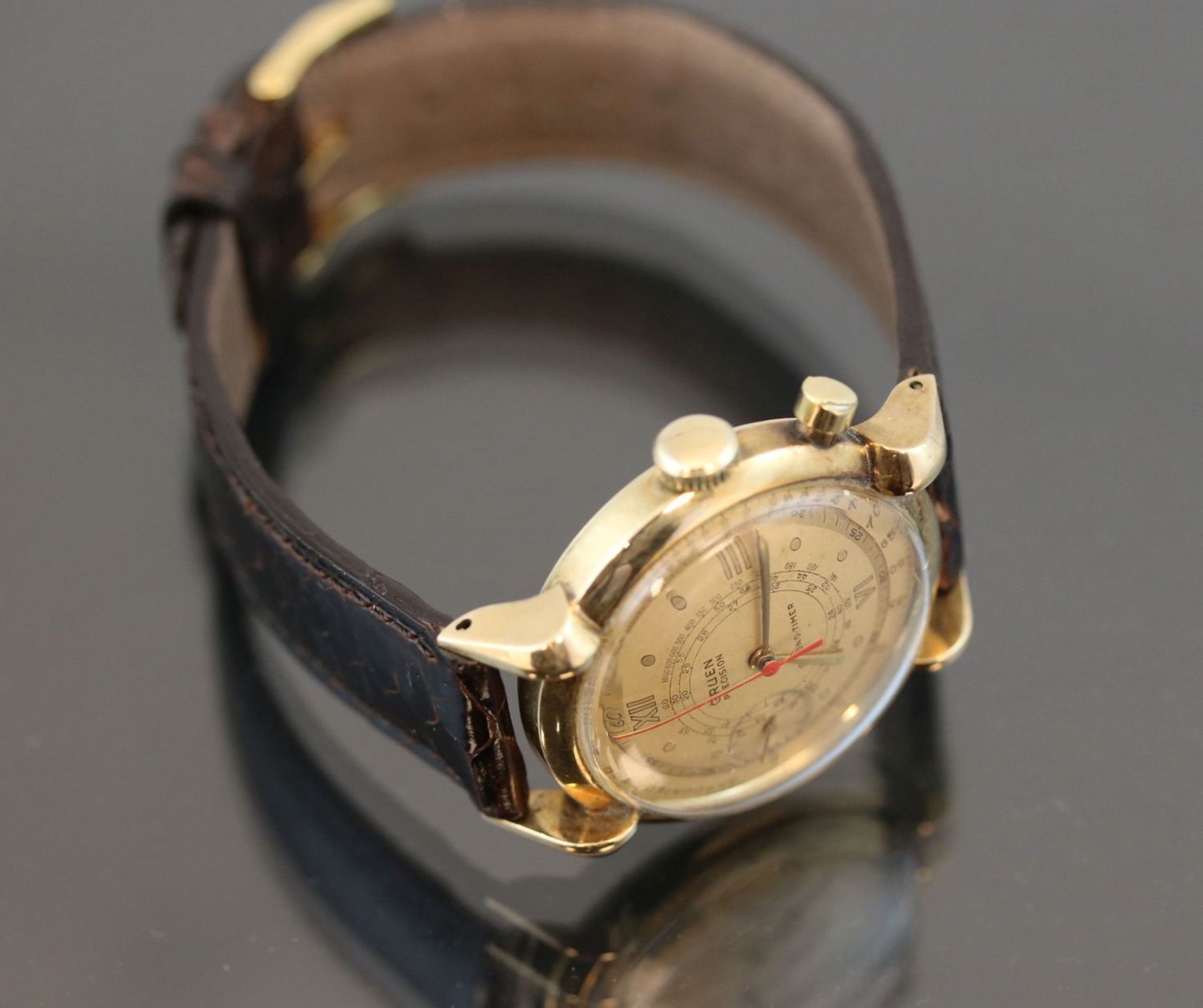 Gruen Precision-Uhr, 585 GoldWerk: Chrono Timer, HandaufzugBand: Braunes LederbandFunktion: - Bild 2 aus 4