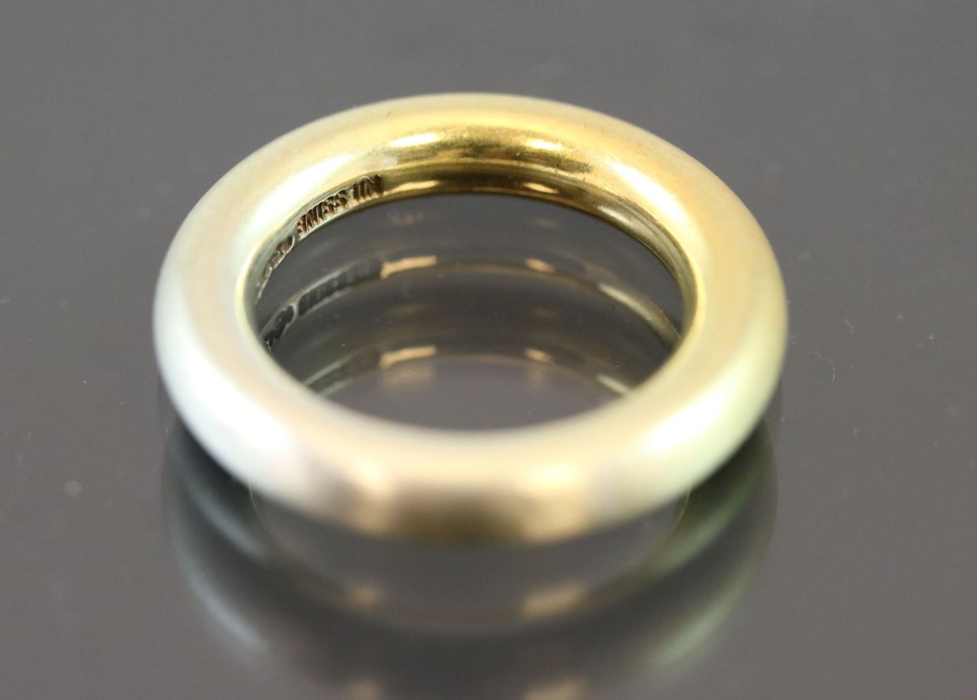 Niessing-Ring, Weißgold/Gelbgold 75013,2 Gramm Ringgröße: 52Schätzpreis: 2000,-