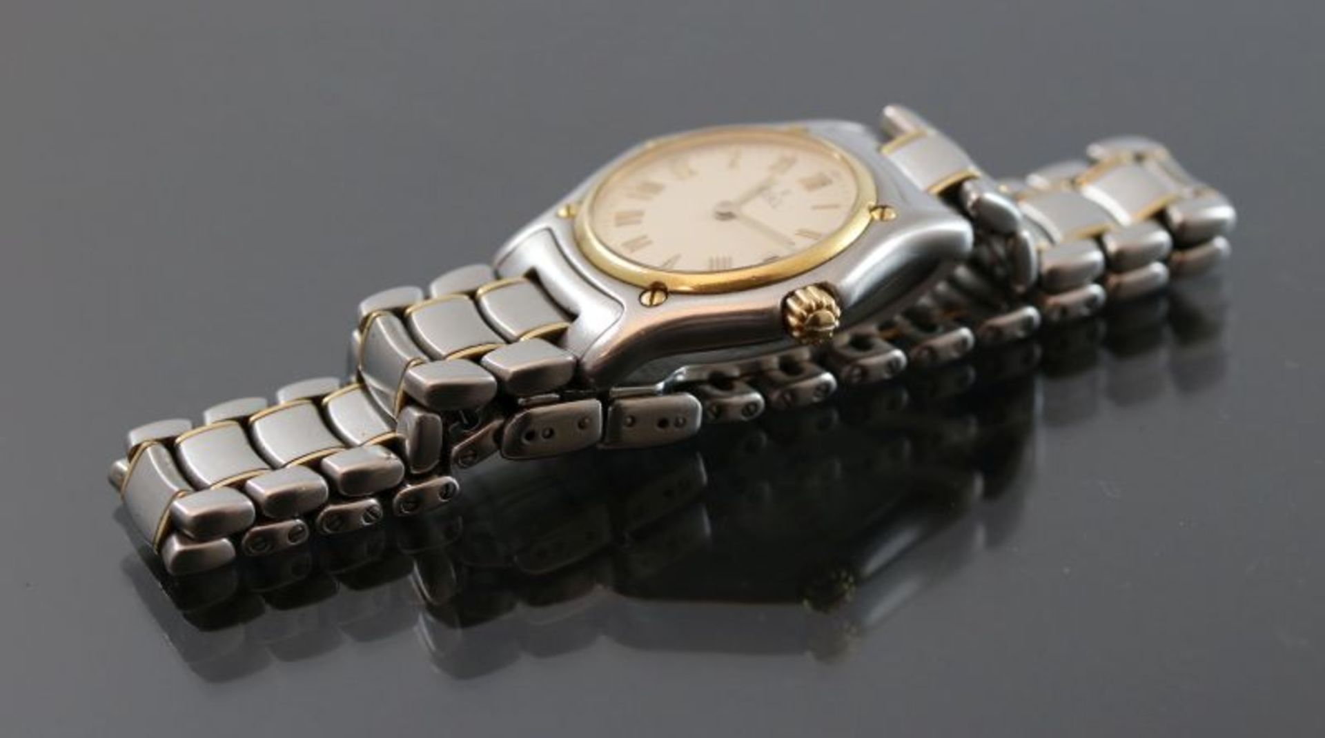 Ebel DamenarmbanduhrWerk: QuartzBand: Stahl/GoldFunktion: DatumsanzeigeGehäuse Ø: 2,6 cm Mit Box und - Bild 4 aus 5