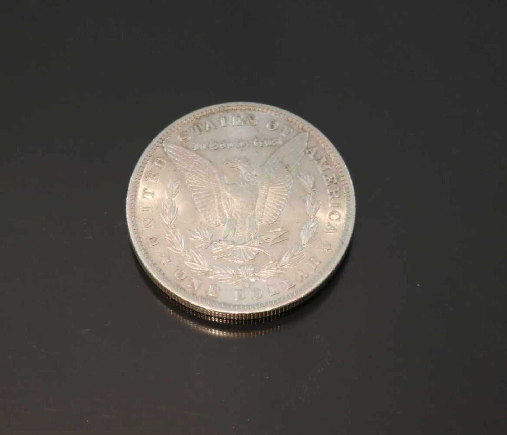 One Dollar 1884, USA, Morgan DollarMaterial: SilberPrägebuchstabe: oGewicht: 26,8 Gramm Größe: 37, - Bild 2 aus 2