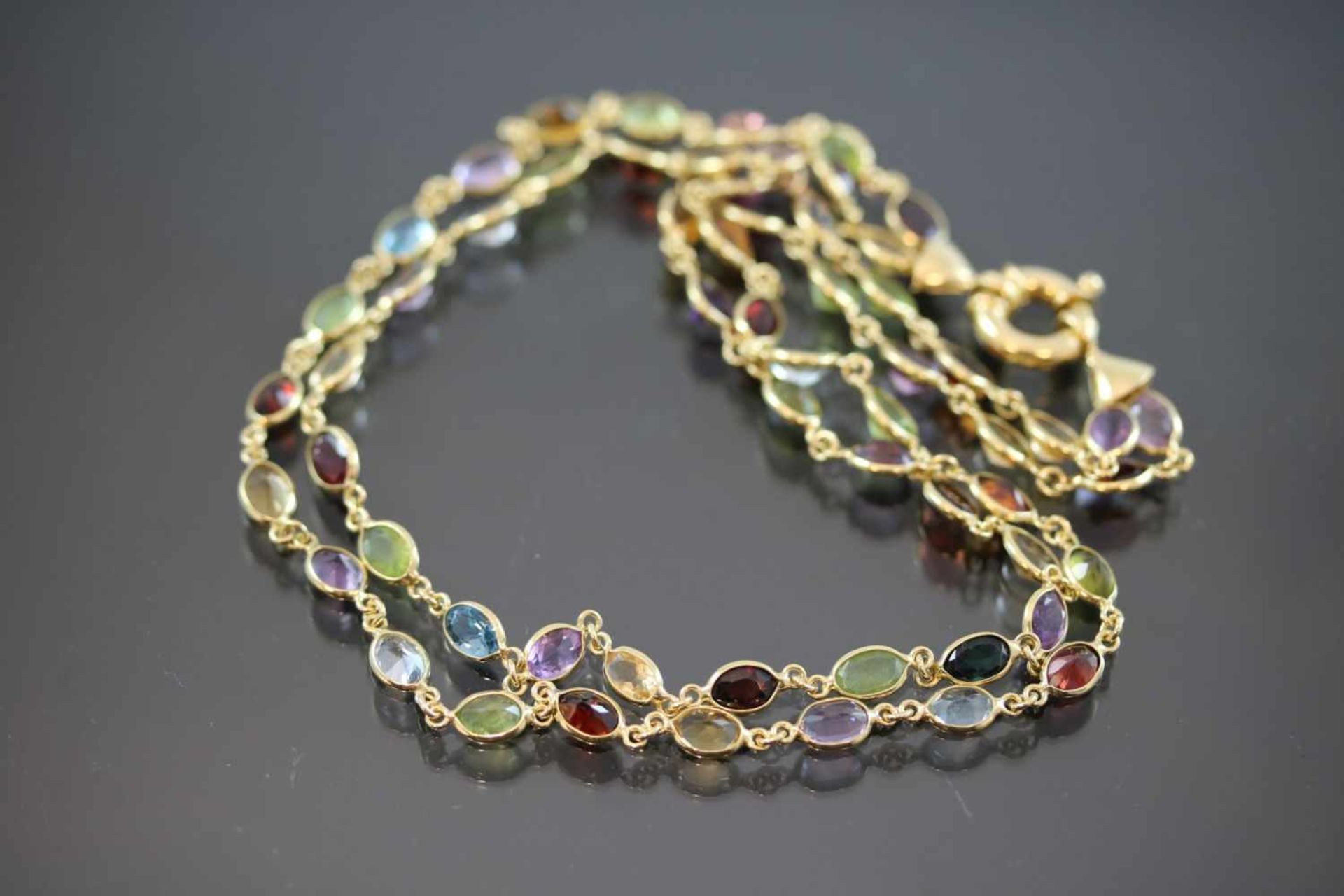 Edelsteinkette, 750 Gelbgold26,50 Gramm Länge: 42 cm Amethyste, Peridote, Citrine, Rhodolithe,