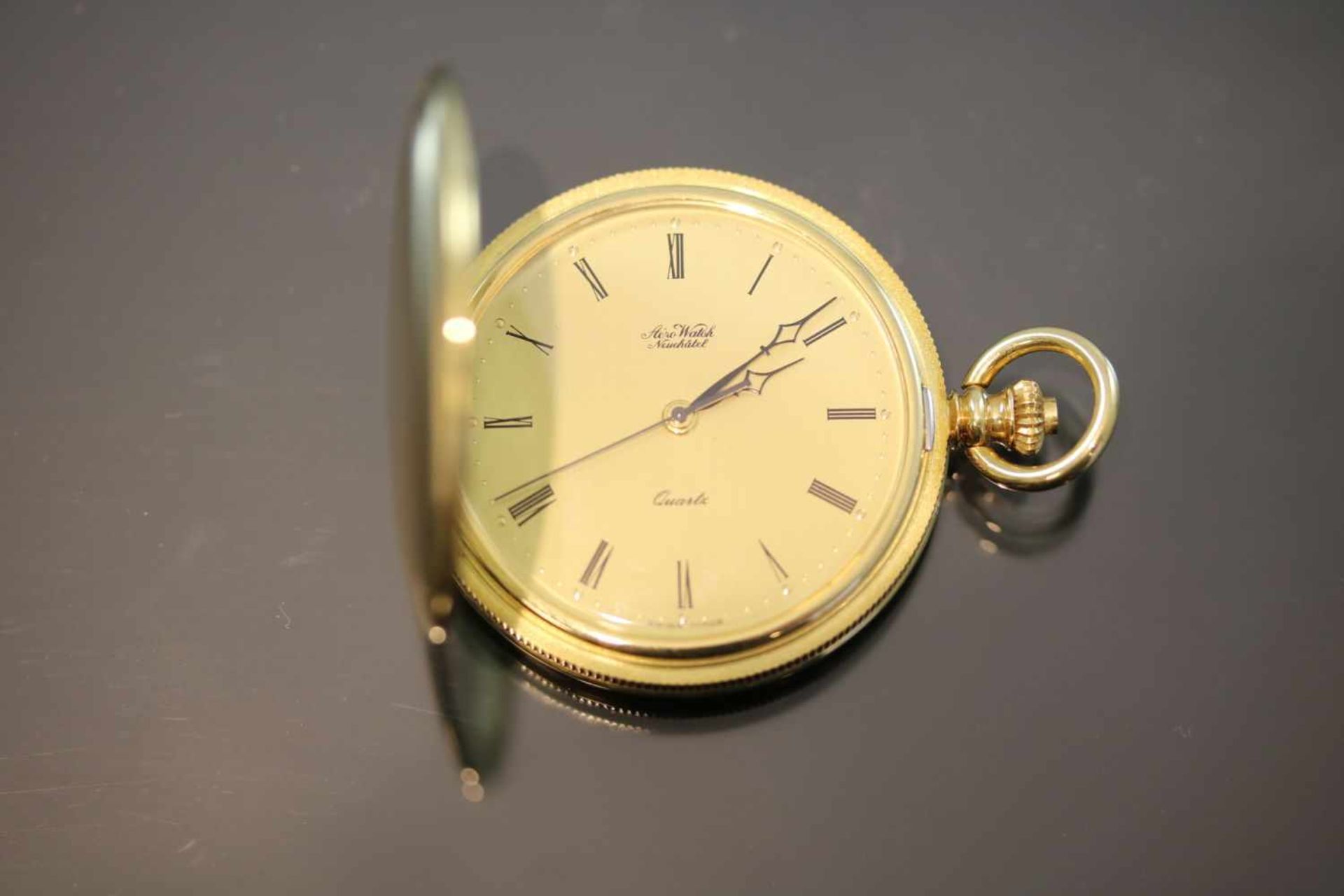 Aero-Watch-Taschenuhr, 750 GelbgoldWerk: QuartzFunktion: SekundneanzeigeGehäuse Ø: 4 cm Gewicht