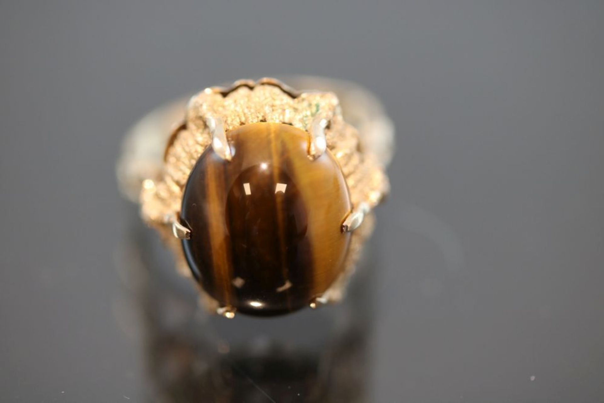 Tigeraugen-Ring, 585 Gold5,3 Gramm 1 Tigerauge, Ringgröße: 52Schätzpreis: 600,- - - -25.00 % buyer's