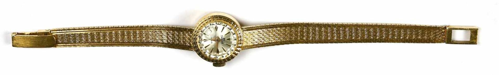 Uhr, Damenuhr, 750er GG., DreffaUhrengehäuse mit Ansatzband. Gehend. Bruttogewicht 18,5 g.