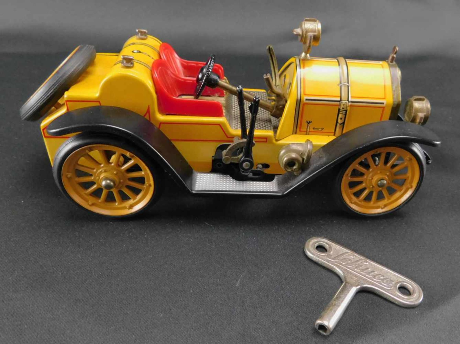 Modellauto Schuco, Mercer 1225 Typ 35J, 1913, Blechmodellmit Aufzug und Schlüssel. Wagen fährt
