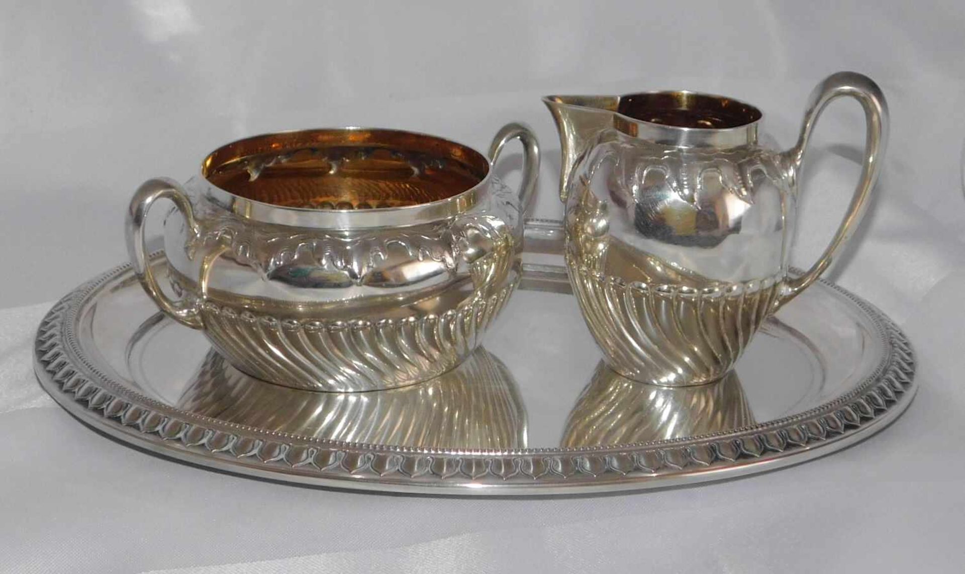 Silber-Set, 3- teilig, Zuckerschale, Sahnegießer und Tablett, 800 Silber, innen vergoldet , ca.