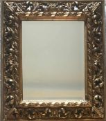 Großer, alter, Spiegel mit barock geschnitztem Holzrahmen, vergoldet, und facettiertes Glas,