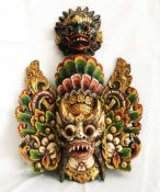 2 alte indonesische Masken, wohl Bali, Holz, farbig gefasst, Altersspuren, 52 x 54 cm sowie 22 x