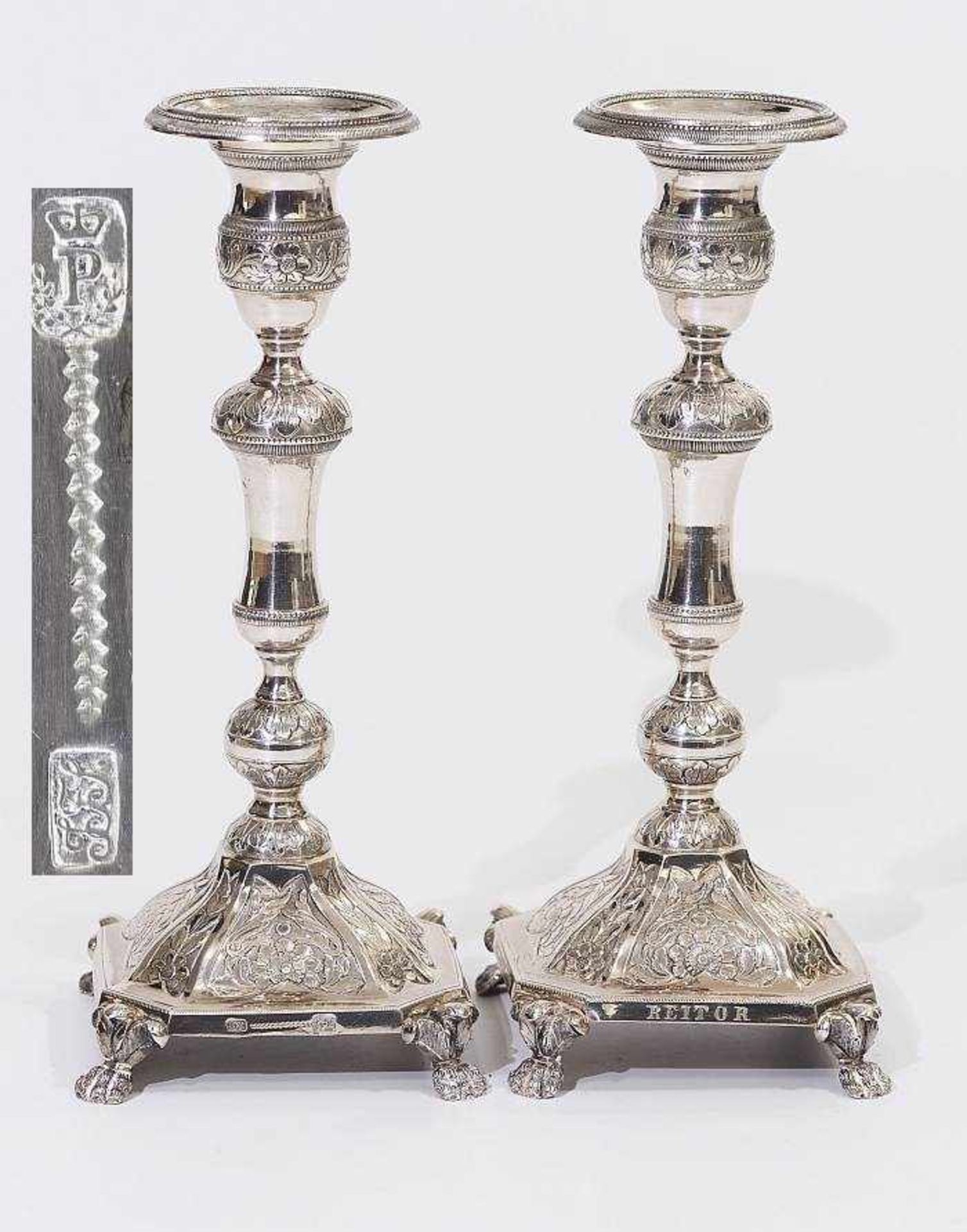 Paar Kerzenleuchter, datiert 1848. Paar Kerzenleuchter, datiert 1848. Silber, getrieben, graviert.