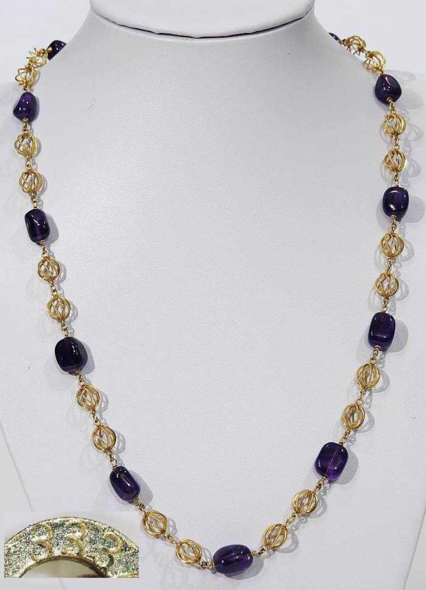 Kette mit Amethyst.Kette mit Amethyst. 333er Gelbgold, Gliederkette mit durchbrochen gearbeiteten