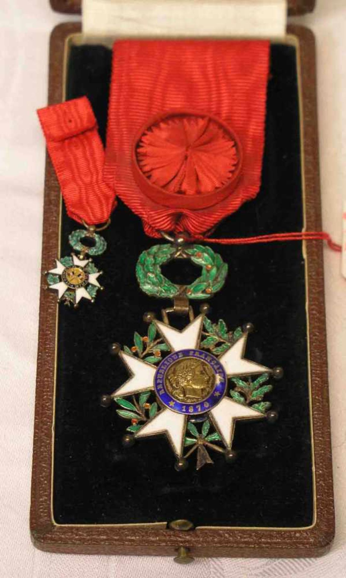 Frankreich. Orden der Ehrenlegion mit Miniatur, 1870; ein Eck beschädigt. Ritterkreuz,Modell ab