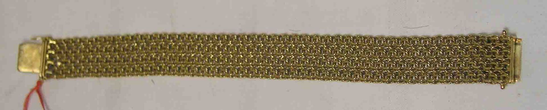 Armband. 8 kt. Gold. Breites Kettengeflecht, Länge: 20,5cm, Breite: 1,5cm, 22,5 Gramm.- - -20.17 %