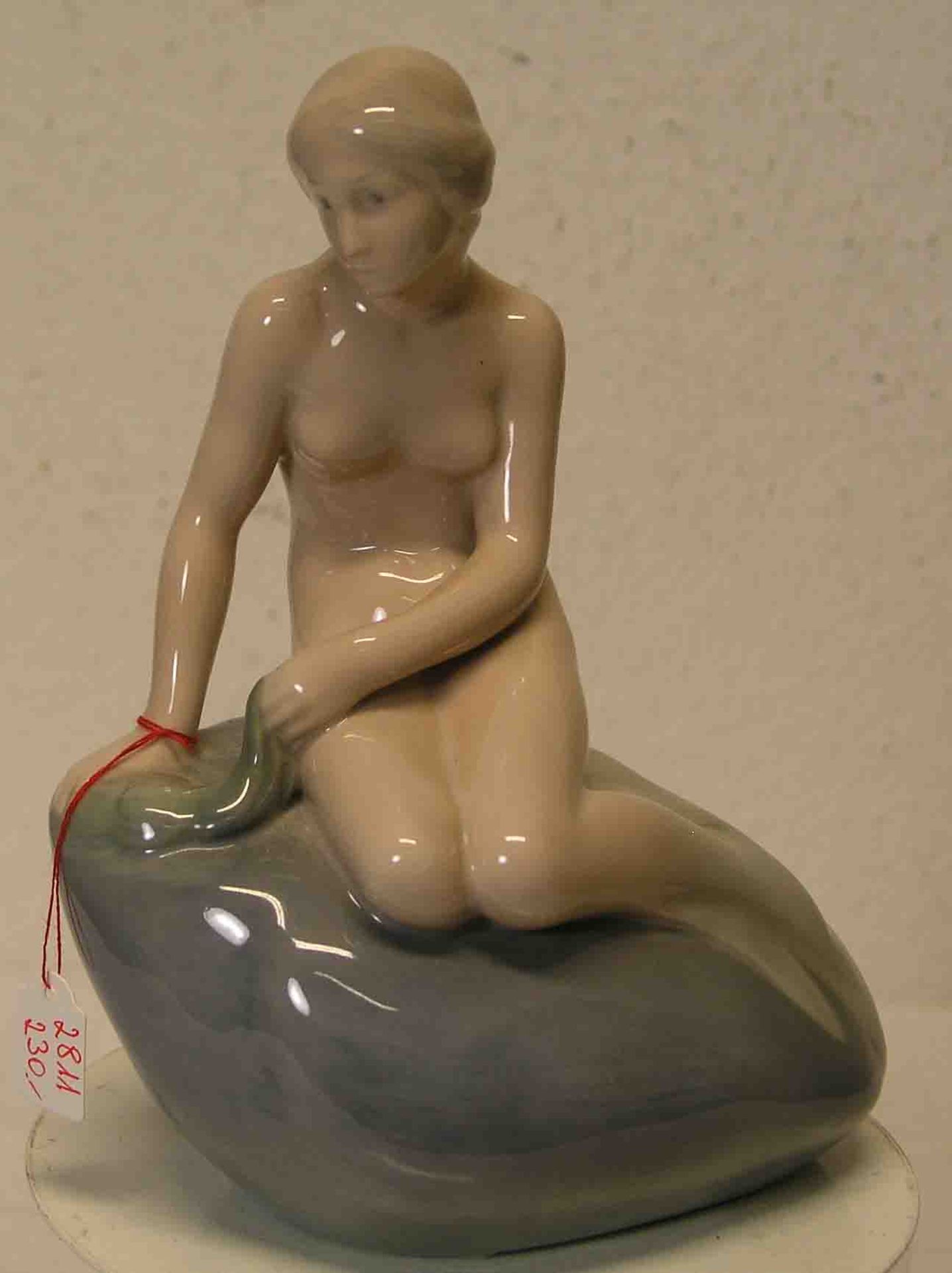 "Die kleine Meerjungfrau". Porzellan, Copenhagen, farbig staffiert, Höhe: 21cm.- - -20.17 % buyer'