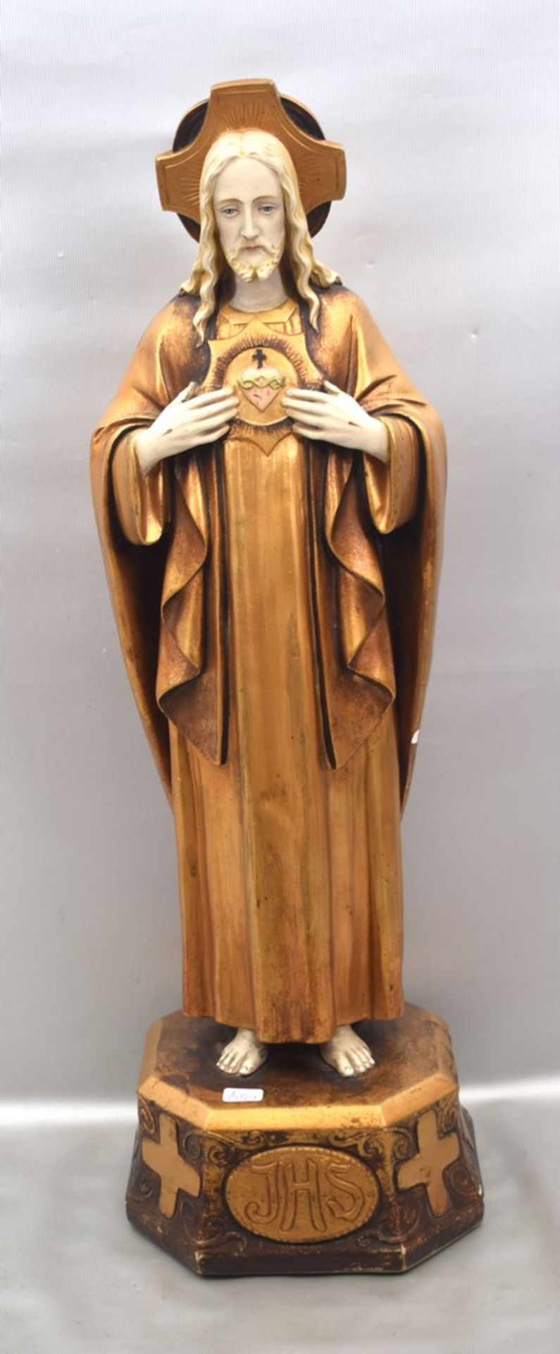 Jesus ChristusGips, auf achteckigem Sockel stehend, weiß/gold bemalt, H 53 cm, FM Schmidt & Heckner,