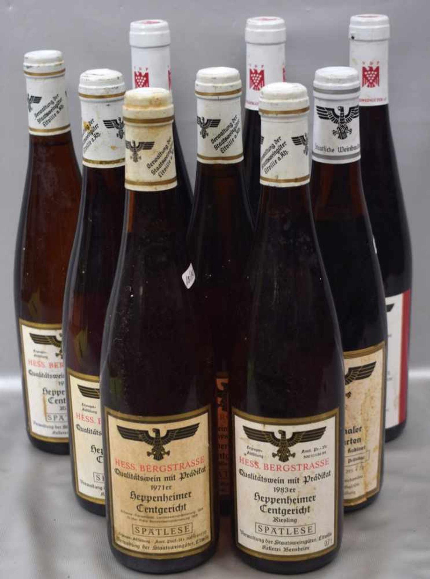Konvolut neun Flaschen WeißweinHeppenheimer Centgericht etc., 1971, 1975, 1983 und 1990