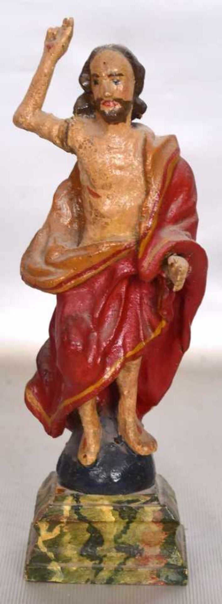 Christusskulpturauf Sockel stehend, Holz geschnitzt, bunt bemalt, H 20 cm, 19. Jh.