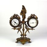 Kommodenuhr (Frankreich, um 1900)Uhr mit Weckwerk sowie Barometer; mittig stehende, weibliche Figur;